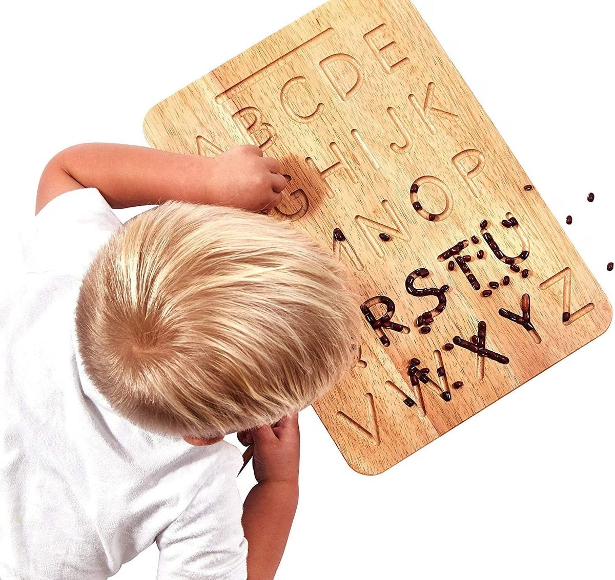 Child forming letters on the Montessori Wooden Letter Tracing Board